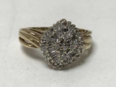 A 9ct gold diamond cluster ring, 3.8g.