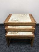 A nest of three table and loom linen box