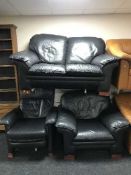 A three piece lounge suite in blue leather