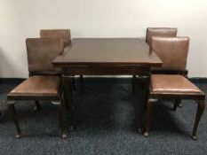A mahogany dining room suite comprising of pull-out dining table,