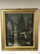 A gilt framed oil on canvas - figures on a street