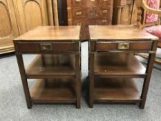 A pair of mahogany and brass-mounted lamp tables, each fitted with a drawer, width 46 cm.