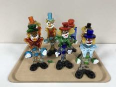 A tray of seven Murano glass clowns