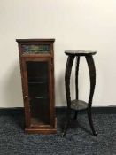 A mahogany glazed door curio cabinet and plant stand