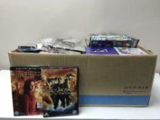 Four boxes of DVDs, CDs,