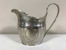 A silver cream jug, 3.