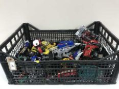 A crate of assorted die vehicles