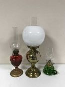 Three oil lamps