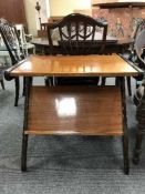 A mid 20th century teak writing table