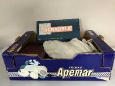 A box of vintage board games and a set of bobbin skittles