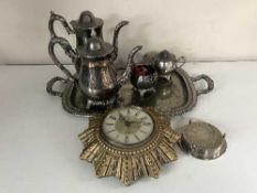 A plated twin handled tray containing four piece plated tea service,