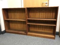 A pair of teak open shelves