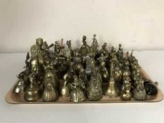 A collection of assorted of metal bells - windmills,