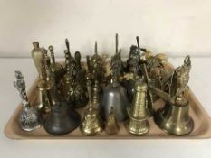 A collection of assorted of brass bells - windmills etc