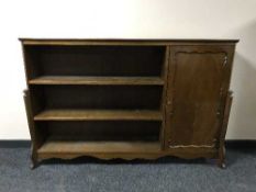 A set of bookshelves fitted a cupboard