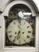 A painted longcased clock with painted dial with pendulum and weights