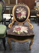 A 19th century mahogany tapestry lady's chair