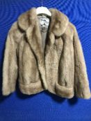 A blonde mink fur jacket, retailed originally by Fenwick French Salon.