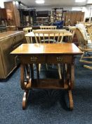 A birds eye maple wood side table