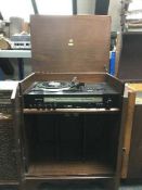 A mahogany cased Dynatron SRX32 turntable with speakers together with a set of Country music