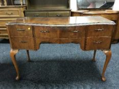 A walnut Queen Anne style dressing table