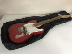 A Shine electric guitar in carry bag