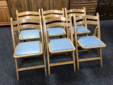 Six beech folding kitchen chairs