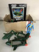 A box of Thunderbirds collectables inc.