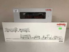 A Marklin 37966 steam locomotive together with a 45102 Frieght Wagon Set (HO Scale),