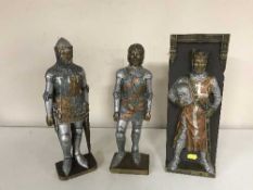 Two Marcus Designs hand made figures of knights and a Marcus Designs wall plaque