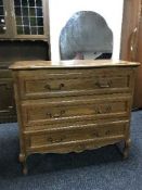 A French oak three drawer chest