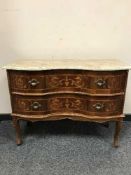 A serpentine front marble top chest,