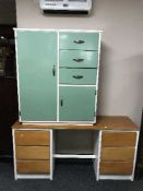A mid 20th century knee hole dressing table and painted linen chest