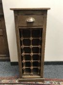 A reclaimed pine wine rack