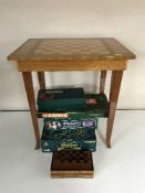 An inlaid musical games table together with two folding card tables,