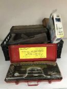 Four wooden drawers of hand tools, socket set, planers and a Bosch cordless drill,