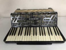 A Hohner Verdi III piano accordion