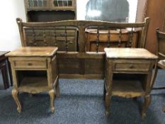A pair of French oak bedside stands