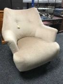 A button back bedroom chair in beige fabric