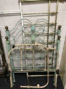 Two antique metal 2'6 bed frames and a metal/brass headboard