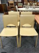 Four leather upholstered dining chairs