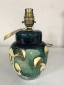 A Moorcroft table lamp with mushroom decoration