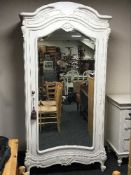 A white Country Corner French style mirror door wardrobe