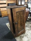 A walnut pot cupboard