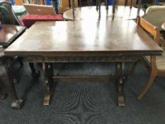 An oak pull out refectory dining table