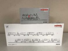 A Marklin 37132 steam locomotive together with a 46030 coal train of the early 1950's (HO Scale),