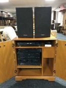 A Technics four piece separate system with speakers in an inlaid yewwood hifi cabinet