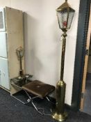 Two brass lamps in the form of street lamps and a 1970's tubular metal telephone stand