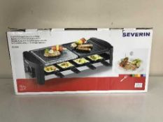 An Severin party grill (boxed and new)
