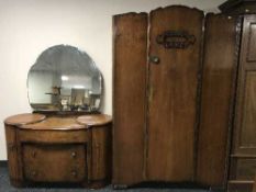 A walnut single door wardrobe and dressing chest